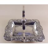 A silver embossed and engraved cake basket with pierced scrollwork rim, Birmingham 1903, maker C.H -