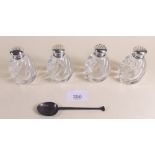 Two pairs of silver and glass salt and pepper pots and a silver seal top teaspoon