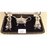 A silver plated cruet set boxed