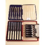 A set of six silver handled tea knives, a silver plated set of coffee spoons and a set of tea