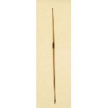 A wooden long bow with horn ends, marked Ariadne