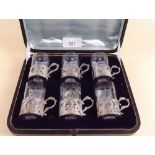 A set of six 19th century continental pierced and embossed silver rococo style liqueur cups with