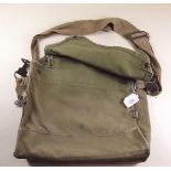 A military shoulder bag for maps etc with military markings in top flap