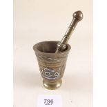 A Cairoware brass pestle and mortar