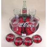 A Coca Cola tray, coaster, glasses etc