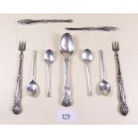 A collection of silver items including a set of four seal top coffee spoons, a pair of pickle forks,