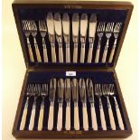 A twelve place setting fish cutlery set - boxed
