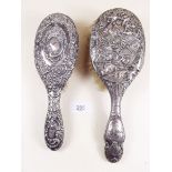 Two silver backed brushes - a/f