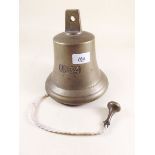 A large 20th century brass bell dated 1834
