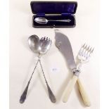 A pair of silver plated fish servers, cased spoon and servers