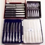 A set of six silver handled tea knives, a silver plated set of spoons and a set of tea knives, all