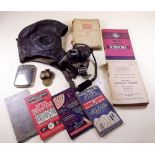 A WWII pilots helmet and a group of military ephemera including manuals, Japanese Intelligence