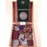 A box of commemorative and sports medals including silver rifle club medals
