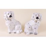 A pair of Beswick Staffordshire style spaniels - 15cm