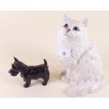 A Doulton cat and a small Scottie dog