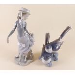 A Lladro group of two swallows perching on branch - 18cm high, and a Lladro figure of lady 'with