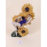 A Carlton Ware limited edition group 'Carlton Girl Sunflowers' by Andy Moss 116/800