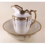 A Victorian gilt and white toiletry jug and bowl