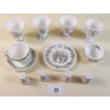 A collection of Royal Doulton Brambly Hedge items including the four seasons egg cups, thimbles, a