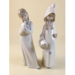 A Lladro figure of girl with basket and a Lladro Nao figure of girl with puppy - one a/f