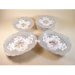 A Victorian floral painted dessert service painted flowers on a white ground with grey and gilt