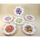 A set of six Royal Albert plates individually decorated flowers