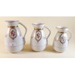 Three Victorian floral graduated jugs