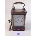 A miniature enamel and brass carriage clock with two keys by Elliott and Son - 4cm