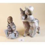 A Lladro group boy and donkey - 22cm, and girl with puppy and kitten