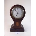 An Edwardian mahogany and satinwood inlaid mantel clock