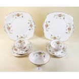 An Edwardian Royal Albert tea service printed poppies and wheat, comprising: seven tea plates, ten