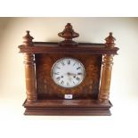 A decorative mantel clock with chiming movement and later made up case