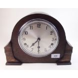 A 1930's oak mantel clock