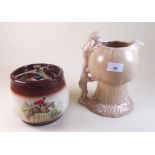 A Sylvac large Pixie and mushroom jug and a Crown Devon tobacco jar