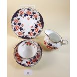 A part Atlas china teaset comprising: ten cups, six saucers, twelve side plates and a milk jug