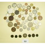 A quantity of world coins, some British and some silver content. Highlights include: Victoria