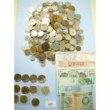 A quantity of world coinage and some banknotes. Examples include: British pre-decimal and decimal,