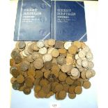 A tin of copper/bronze halfpennies, pennies, Victorian through Elizabeth II, approx 3 kilos plus (2)