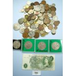 A tin of world coins pre-decimal and decimal including brass threepences, commemoratives, Channel