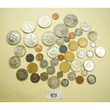 A quantity of miscellaneous world coins including commemoratives x 7, Canadian cents and dollars,