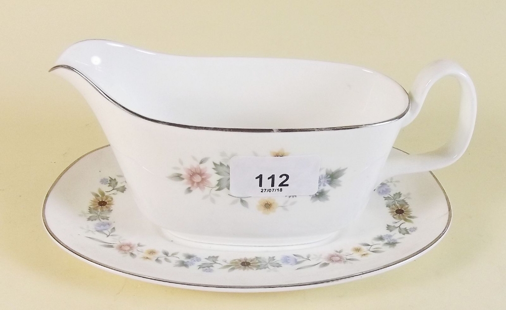 A Royal Doulton Pastorale dinner service comprising eight tea cups and saucers, dinner plates,