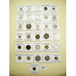 A quantity of approx 30 world coins, some silver. Examples include: Greek 20 Dracma, German 10