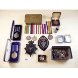 A WWI medal to PTE D Ward 33128 Bedford Regt, Victorian fabric badge, two Police Service medals,