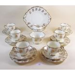 A Salisbury tea service comprising six cups and saucers, six tea plates, cake plate, milk and