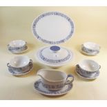 A Royal Doulton 'Cranbourne' part dinner service comprising: two circular lidded tureens, six soup
