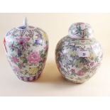 Two reproduction Chinese vases and covers with floral decoration - 26 and 28cm