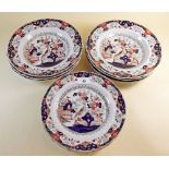 A set of six Victorian Masons Ironstone bowls and four breakfast plates decorated birds in a garden