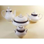 A Royal Doulton 'Stanwyck' part dinner service comprising teapot, coffee pot, jug, sauce boat, eight