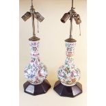 A pair of Chinese Canton style lamp bases decorated butterflies etc