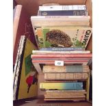 A box of children's books including early Ladybird, Peter Pan and Wendy, Barbar etc